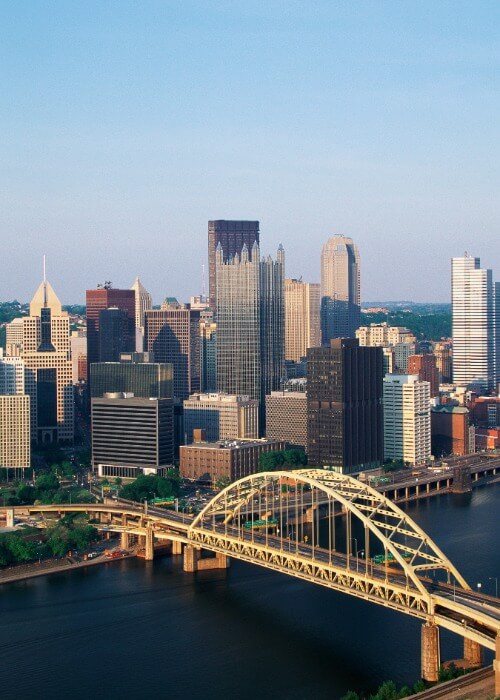 Downtown Pittsburgh skyline and bridge view representing Penguin Clean Co proudly serving Pittsburgh, PA and the South Hills community.